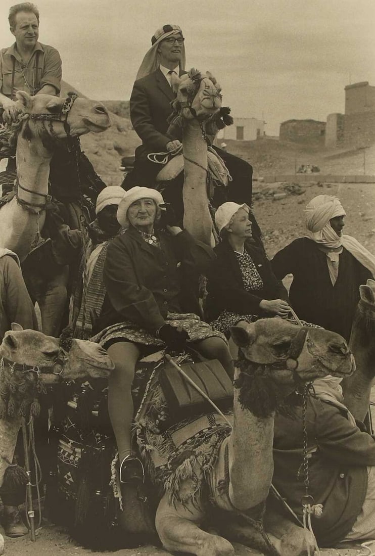 ▲ Thomas Hoepker (German, 1936-2024) Tourists near the Pyramids of Giza, Egypt, circa 1962: ▲ Thomas Hoepker (German, 1936-2024) Tourists near the Pyramids of Giza, Egypt, circa 1962 silver gelatin print, possibly printed later (visible 32.5 x 21.5cm; framed 46 x 34cm) Provenance: The