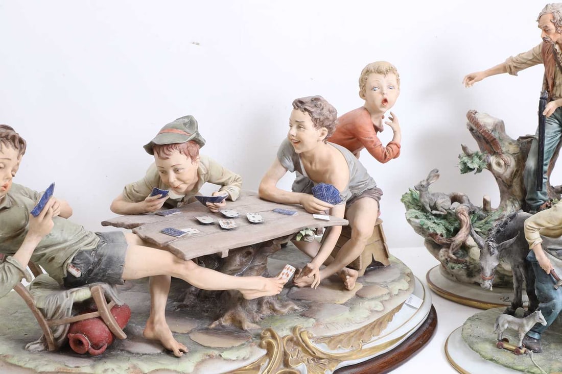 Four Capodimonte figure groups, 20th century, - 2