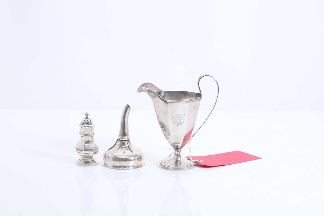 An American silver cream jug,: An American silver cream jug, by George W. Shiebler & Co, New York, late 19th to early 20th century, marked 'STERLING/ BIGELOW & KENNARD & CO' of faceted form with looped handle and