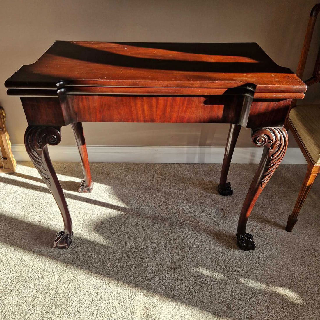 A George II mahogany fold-over card table, circa 1750, - 4