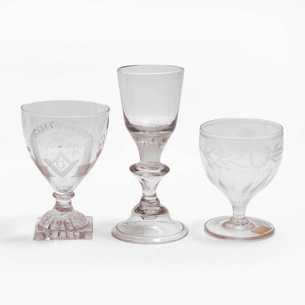A small group of table glass, comprising:: A small group of table glass, comprising: a wine glass, circa 1770, German, possibly Lauenstein, a rummer, circa 1800, with a moulded ovoid bowl, with an engraved border, and a Masonic rummer, early 1