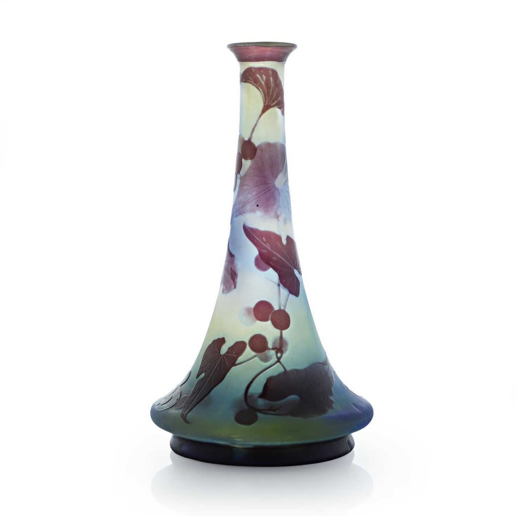 Émile Gallé (French, 1846-1904), a cameo glass vase, early 20th century, French,: Émile Gallé (French, 1846-1904), a cameo glass vase, early 20th century, French, cased and cut with foliage and berries, in tones of green and blue, cameo signature 'Gallé' (10.6cm diam