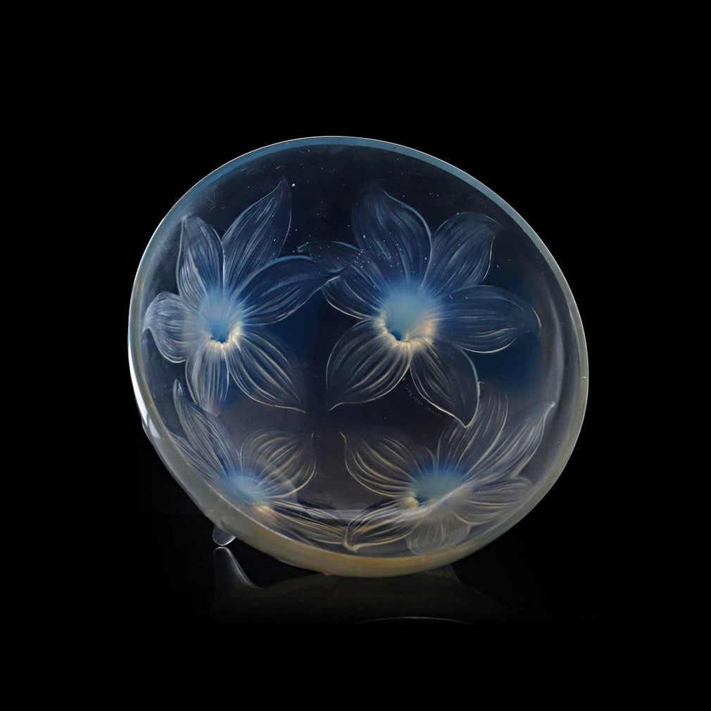 René Lalique (French, 1860-1945), a 'Lys' bowl, No. 382, designed in 1924,: René Lalique (French, 1860-1945), a 'Lys' bowl, No. 382, designed in 1924, moulded and opalescent glass, with engraved signature 'R. Lalique, France', (24cm diameter, 12.5cm high) Condition Repor
