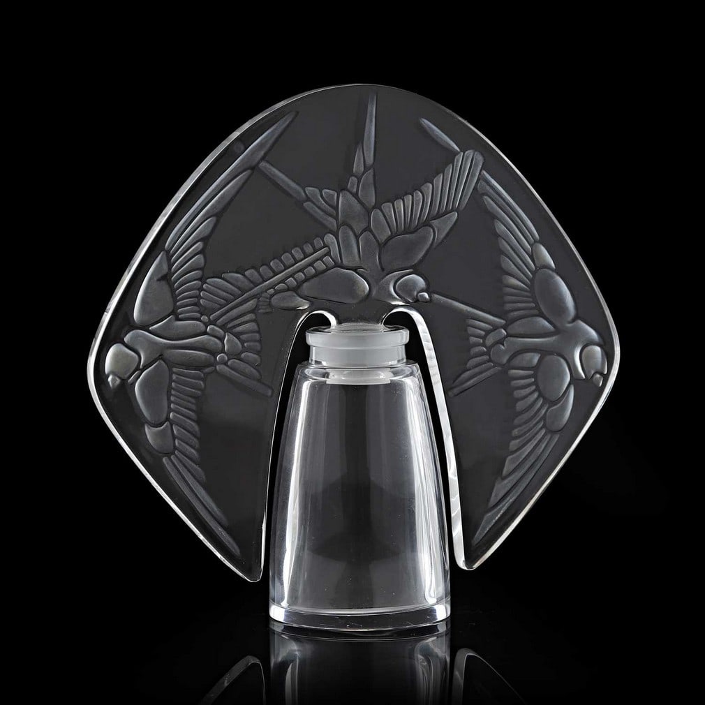 René Lalique (French, 1860-1945), a 'Bouchon Trois Hirondelles' scent bottle, No. 496, designed: René Lalique (French, 1860-1945), a 'Bouchon Trois Hirondelles' scent bottle, No. 496, designed in 1920, moulded and frosted glass, with engraved signature 'R Lalique France' to stopper (12.3cm w