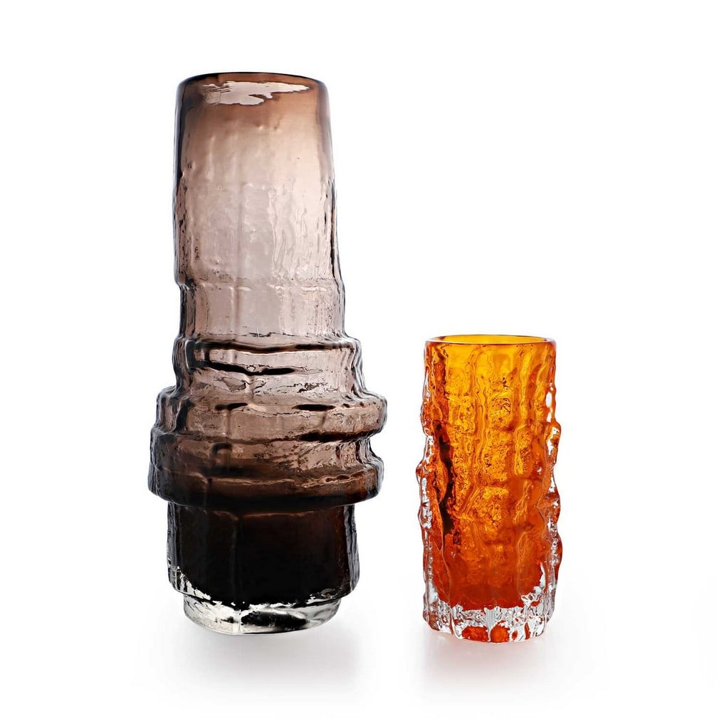 Geoffrey Baxter (British, 1922-1995), two Whitefriars Textured Range glass vases, circa 1970,: Geoffrey Baxter (British, 1922-1995), two Whitefriars Textured Range glass vases, circa 1970, comprising: a 'Hoop' vase, No. 9680, in cinnamon, and a 'Bark' vase, No. 9689, in tangerine (Hoop 29cm hig