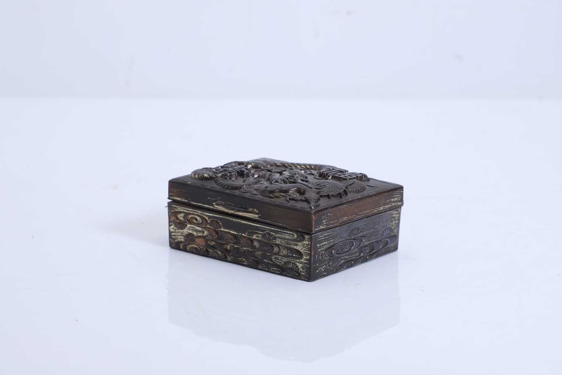 A Japanese silvered bronze box, 20th century,: A Japanese silvered bronze box, 20th century, decorated with dragons and calligraphy, the interior lined 11cm wide