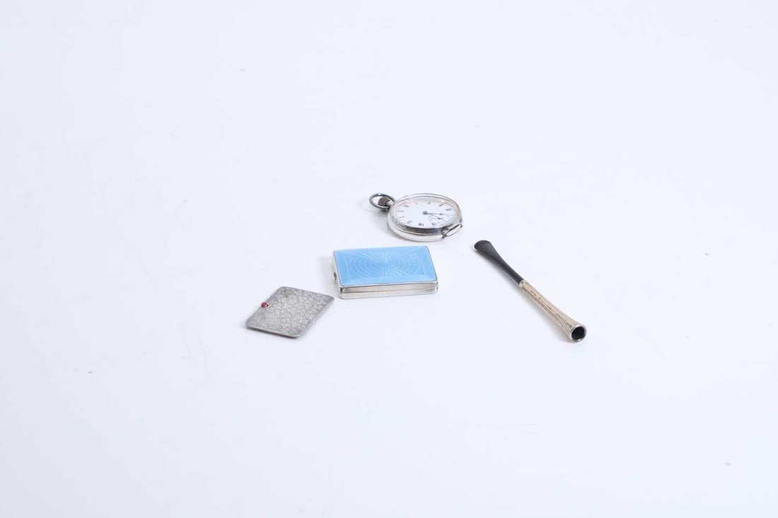 A collection of silver items,: A collection of silver items, to include a silver stamp box, by Ahronsberg Brothers, Birmingham, 1912, decorated with shamrocks, and red paste stone, and intialled 'CJ', an enamelled and gilded