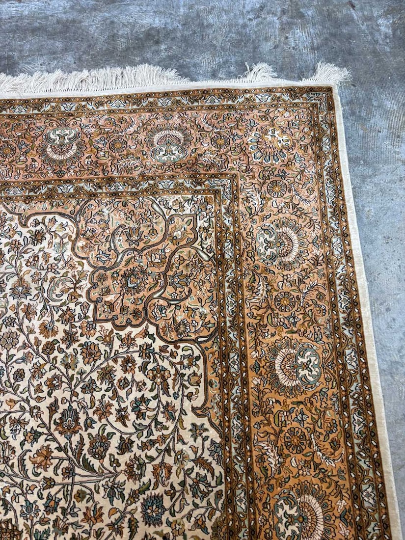 A Persian design part silk rug, - 20