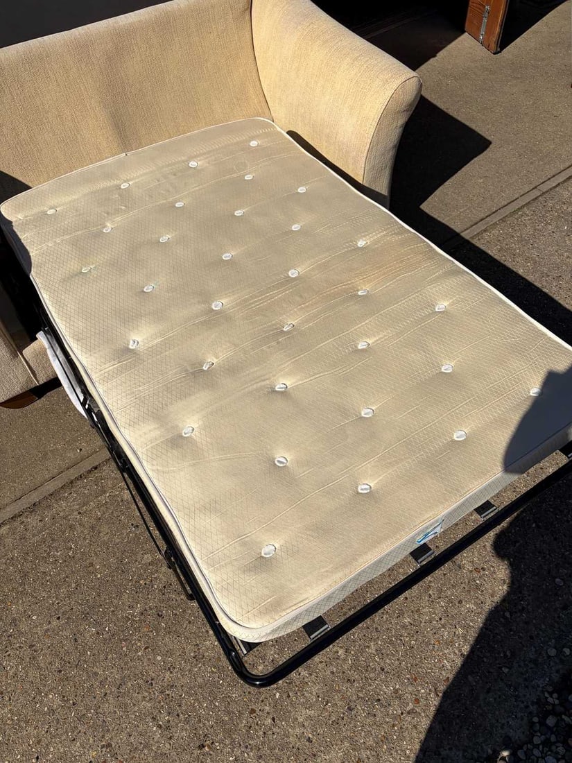 A two seater sofa bed, of recent manufacture, - 4