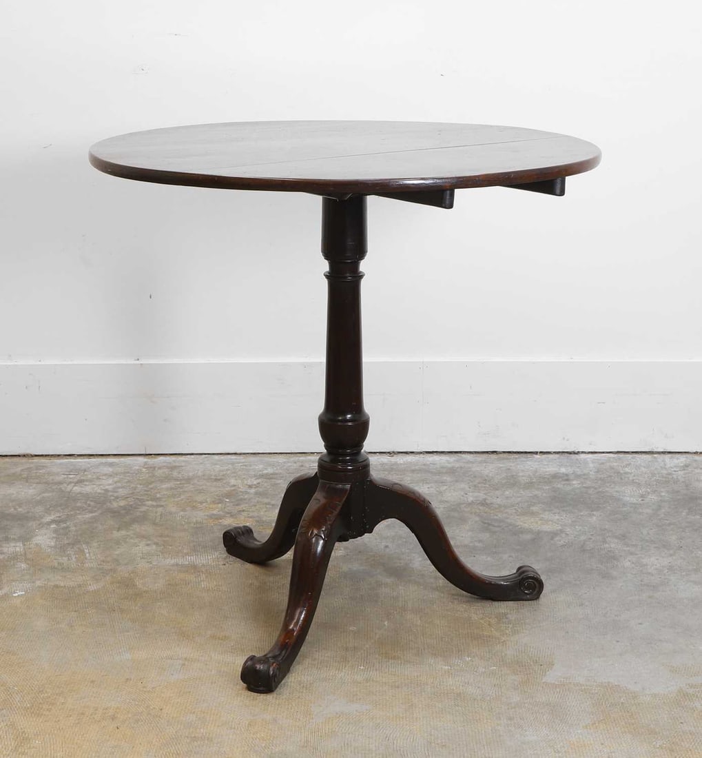 A George III mahogany tripod table, mid 18th century, - 2