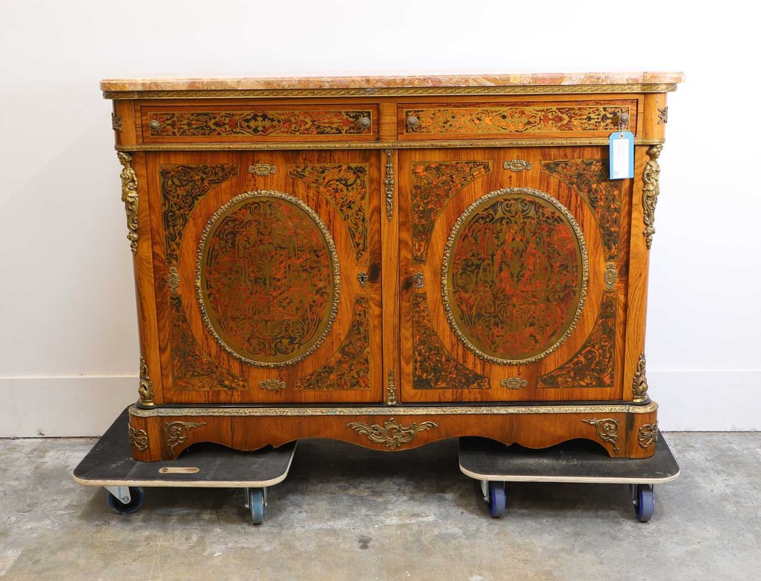 A rosewood, tortoiseshell and brass meuble d'appui, 19th century, French,: A rosewood, tortoiseshell and brass meuble d'appui, 19th century, French, in the manner of Andre-Charles Boulle, of shaped outline the rouge marble top above two frieze drawers and a pair of
