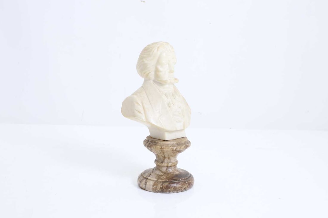 A bust of Beethoven, 20th century,: A bust of Beethoven, 20th century, on a circular marble socle plinth 21cm high
