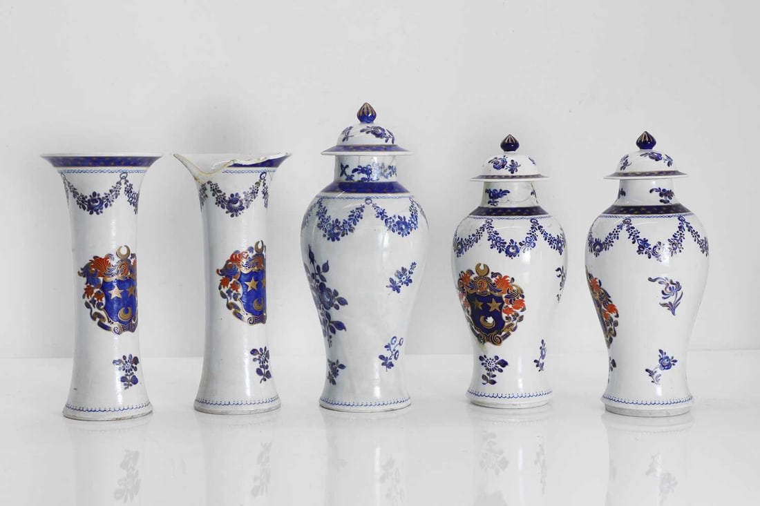 A Samson porcelain Chinese export style five-piece vase garniture, 19th century,: A Samson porcelain Chinese export style five-piece vase garniture, 19th century, each painted with an armorial crest largest 31.5cm high 5 Condition Report: Extensive damages and losses, and
