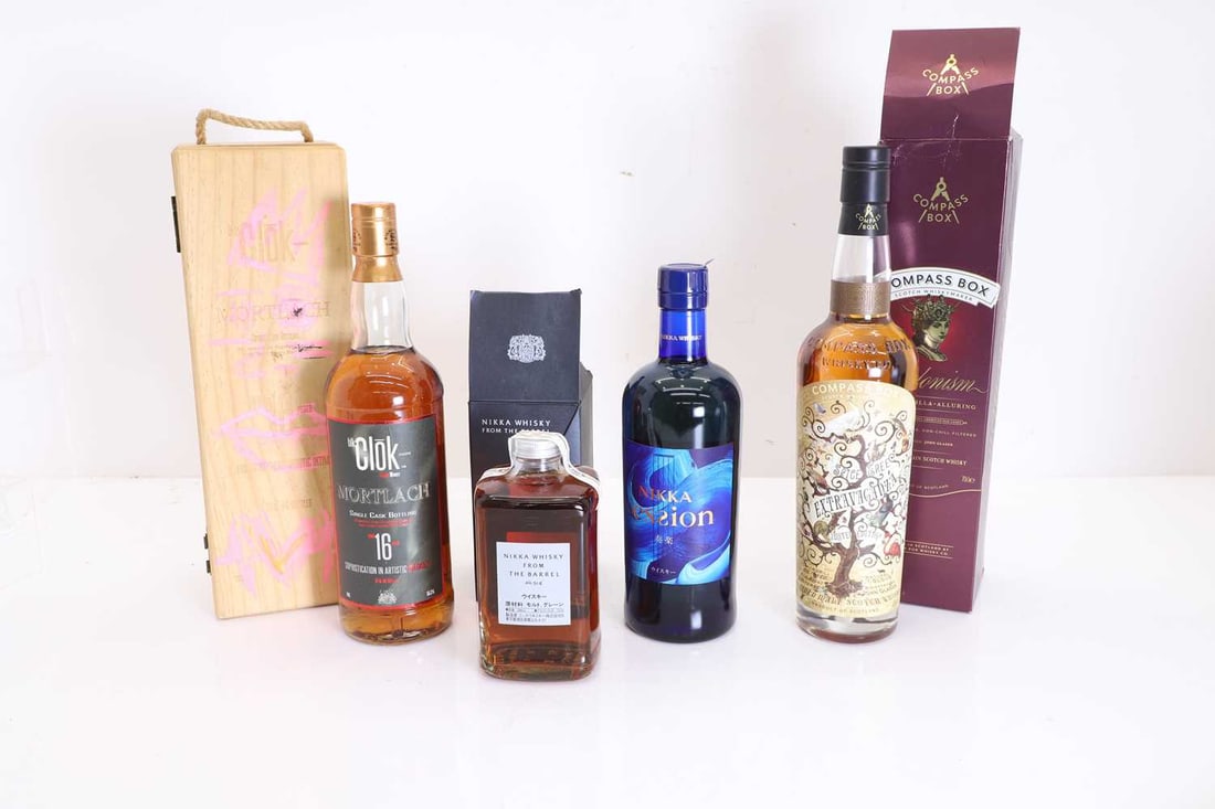 A selection of whiskies,: A selection of whiskies, including Japanese and Chinese, assorted makers and types, as per photographs (4 bottles in total including 2 in presentation boxes)Shipping Disclaimer: Please note we