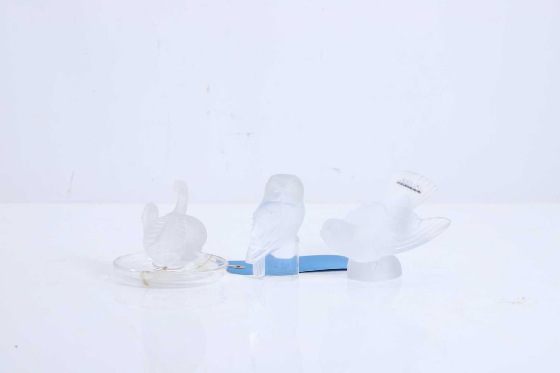 A Lalique satin glass bird,: A Lalique satin glass bird, with the Lalique label to the tail, together with the Deux Cygnes pin dish, with a shaped base, and a Shivers Owl sculpture 3 Condition Report: The pin dish -