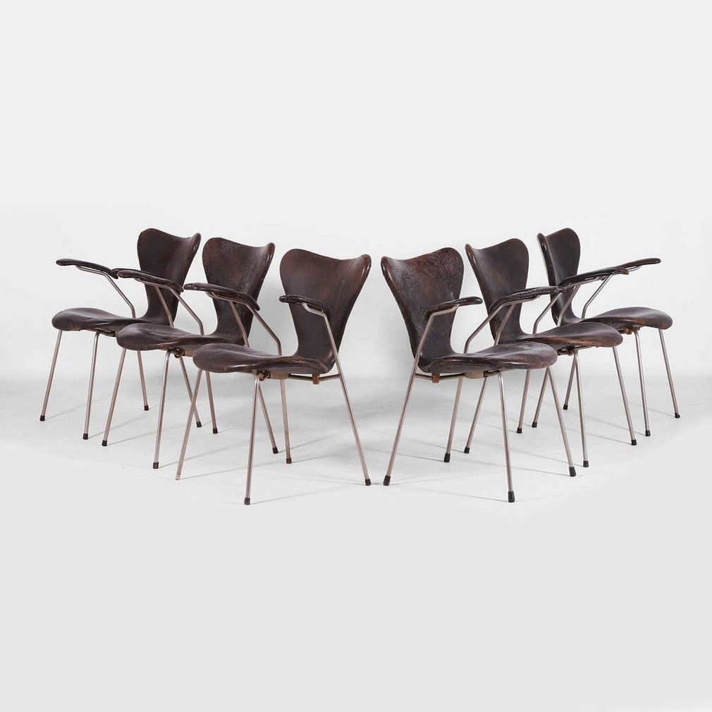 Arne Jacobsen (Danish, 1902-1971) for Fritz Hansen, a set of six 'Series 7' dining armchairs,: Arne Jacobsen (Danish, 1902-1971) for Fritz Hansen, a set of six 'Series 7' dining armchairs, originally designed in 1955, circa 1960s, model '3207', each steel tubular frame with brown leather uphols