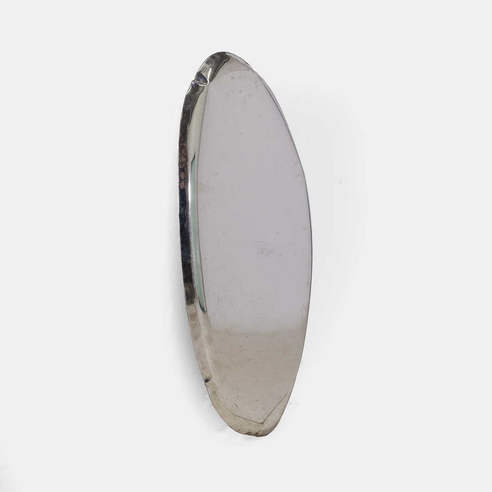 Zieta, a 'Tafla 04' mirror,: Zieta, a 'Tafla 04' mirror, of recent manufacture, Polish, polished stainless steel (121cm wide, 6cm deep, 62cm high) Provenance: The Richard Collins Collection. Condition Report: In good ov