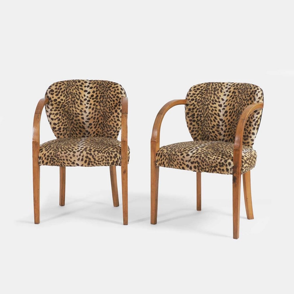 Art Deco, a pair of armchairs,: Art Deco, a pair of armchairs, circa 1930s, each oak frame with leopard print fabric upholstery (52.5cm wide, 44cm deep, 78cm high, 48cm to seat) (2) Provenance: A private collection, London. Conditio