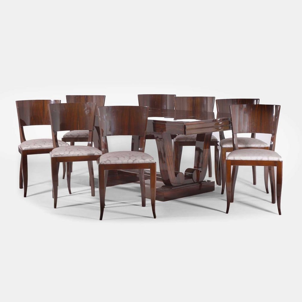 Art Deco style, a Macassar dining suite,: Art Deco style, a Macassar dining suite, of recent manufacture, the table with a rectangular top, extending at both ends, raised on two scrolled bases over two stepped plinths, united by a stretcher,