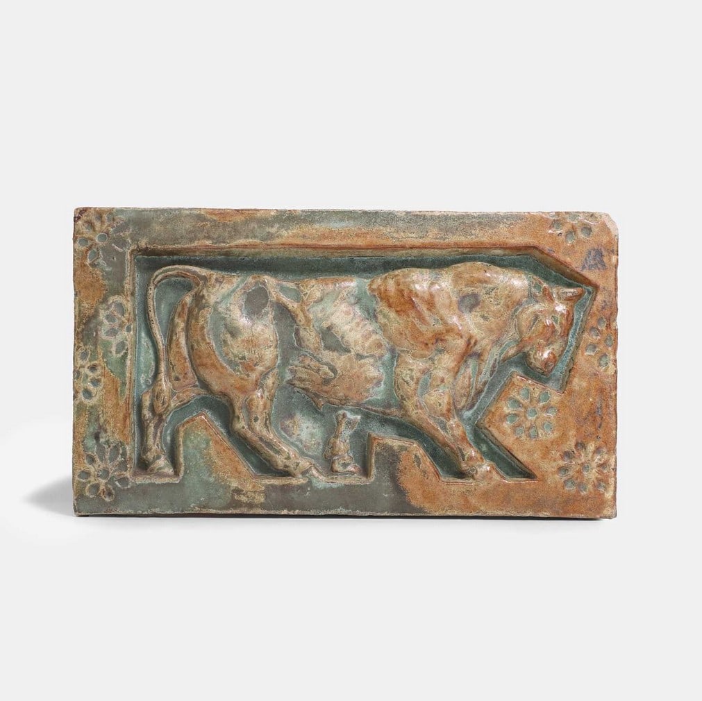 Alexandre Bigot (French, 1862-1927), a ceramic of a bull,: Alexandre Bigot (French, 1862-1927), a ceramic of a bull, circa 1900-1910, after a design by Paul Jouve, stoneware, impressed marks (32cm wide, 3cm deep, 17.8cm high)