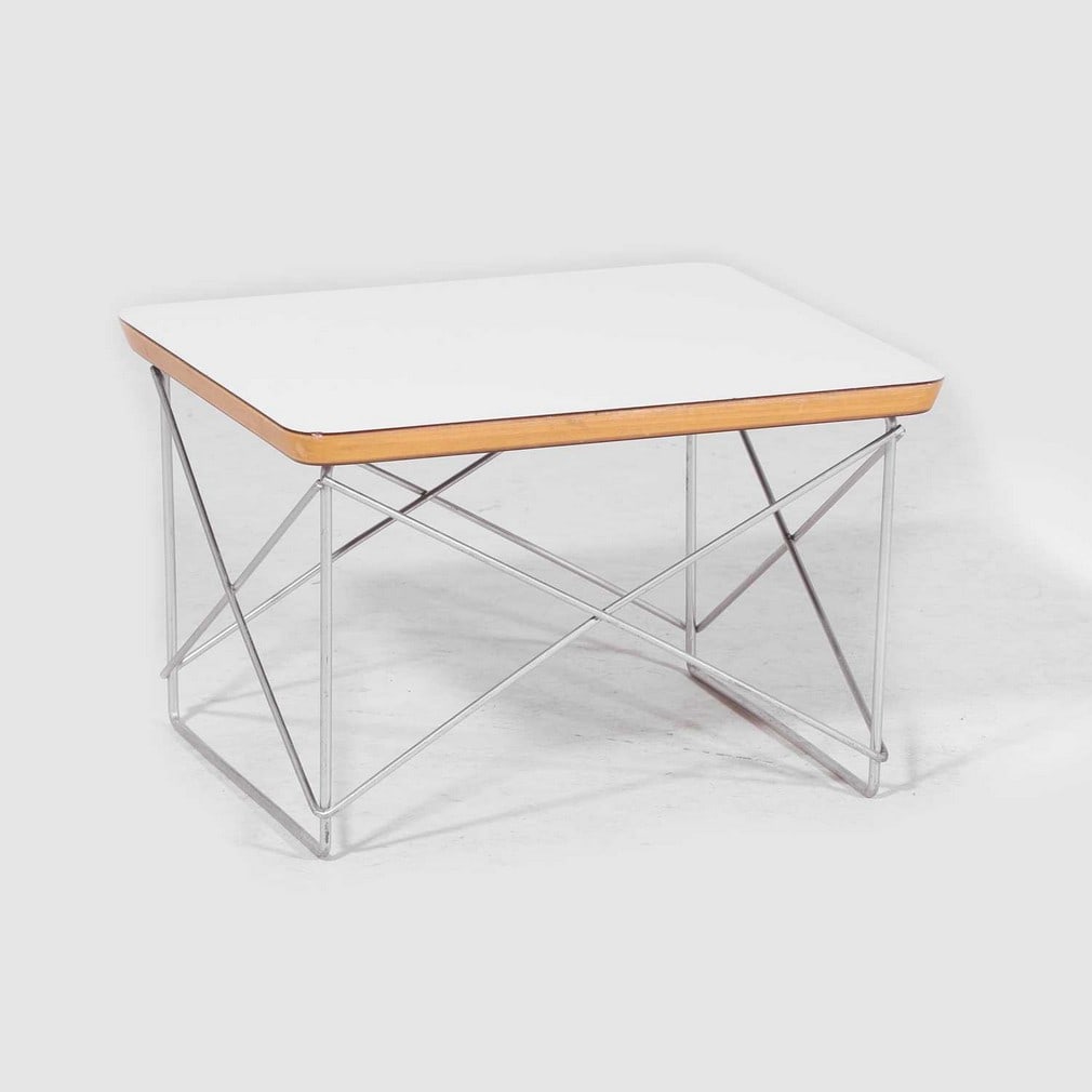 Charles Eames (American, 1907-1978) and Ray Eames (American, 1912-1988) for Herman Miller, an 'LTR': Charles Eames (American, 1907-1978) and Ray Eames (American, 1912-1988) for Herman Miller, an 'LTR' Occasional table, designed in 1950, manufactured 1960s, the laminate top raised above a stainless st
