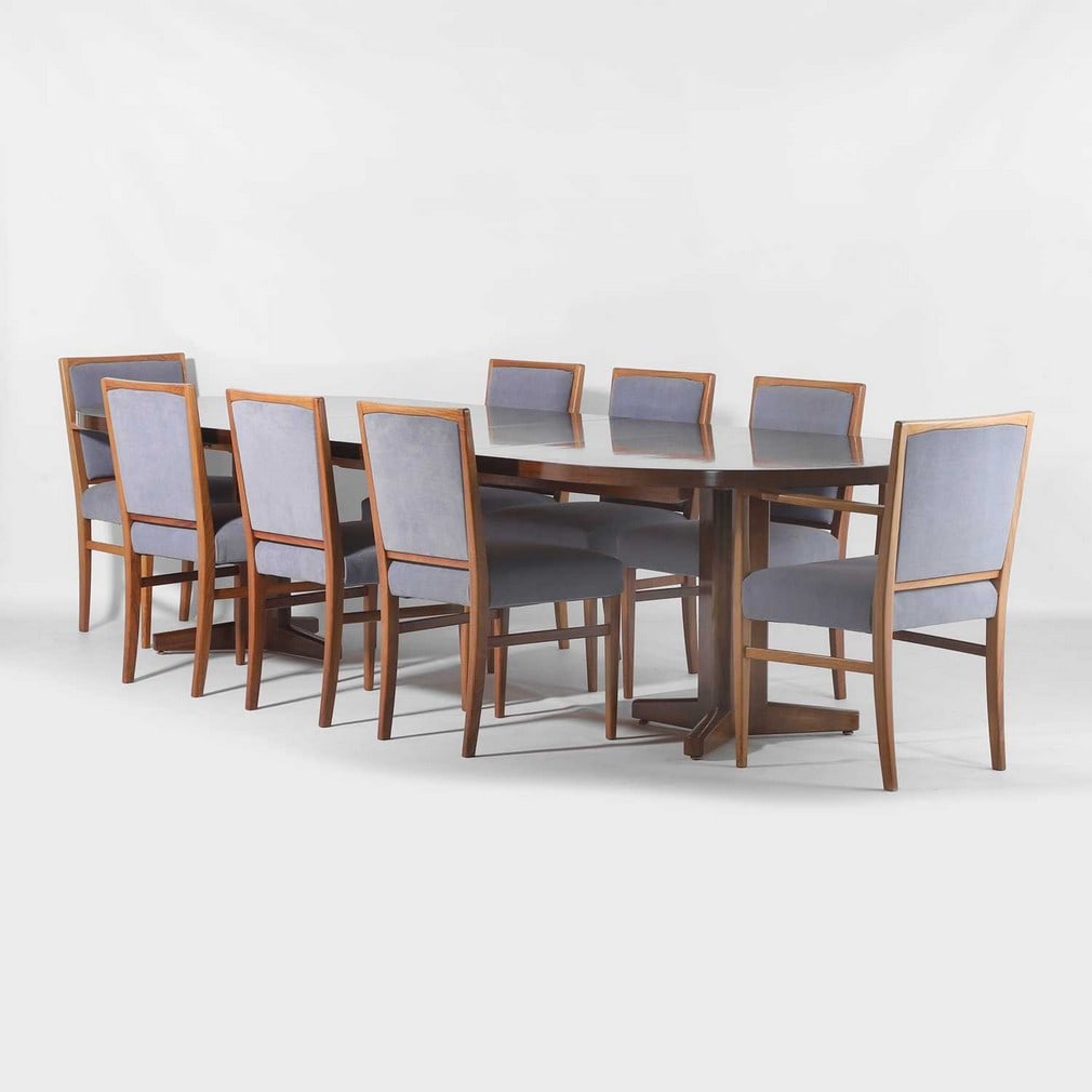 § Robert Heritage (British, 1927-2008) for Archie Shine, a rosewood dining suite,: § Robert Heritage (British, 1927-2008) for Archie Shine, a rosewood dining suite, comprising a rosewood extending dining table, c.1970s, the curved-edge top raised on tripod supports, together wi