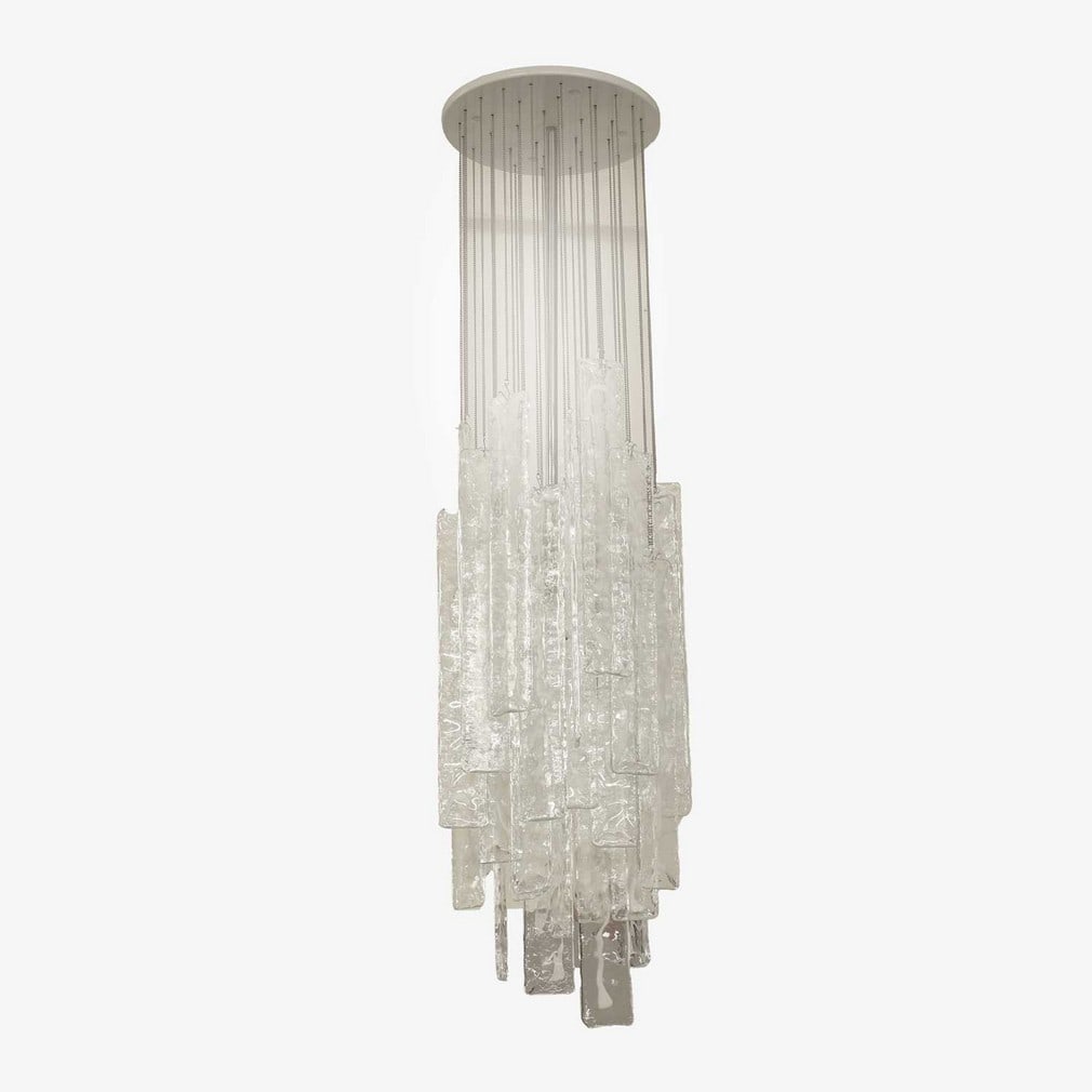 Mazzega style, a cascade chandelier,: Mazzega style, a cascade chandelier, of recent manufacture, the glass panels hanging from chains and hooks, with a central stem with a bulb, mounted to an enamelled white circular fitting (30cm wide,