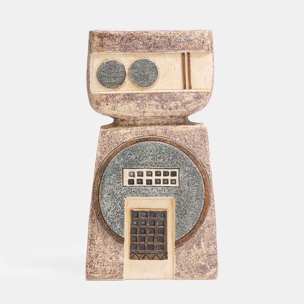 Avril Bennett for Troika Pottery, a double base vase,: Avril Bennett for Troika Pottery, a double base vase, of shouldered form, cast in low relief with geometric panels, with a portcullis on one side, an arrow on the other, in shades of blue and buff, pa