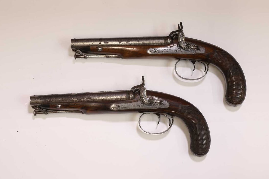 A pair of Charles Moore patent cased double-barrelled percussion pistols, c.1830, - 5