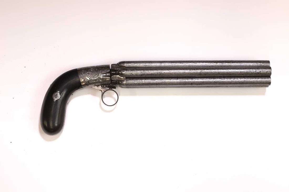 A Belgian Mariette patent six shot double action percussion pepperbox revolver, Liège proof, ci: A Belgian Mariette patent six shot double action percussion pepperbox revolver, Liège proof, circa 1850 with etched twist turn-off barrels numbered from 1 to 6, scroll-engraved action, under-ham