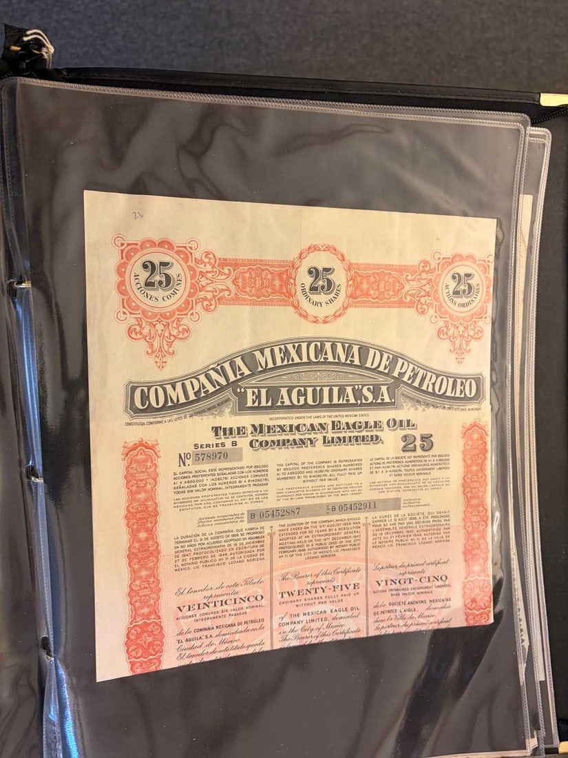 A collection of share certificates, - 12