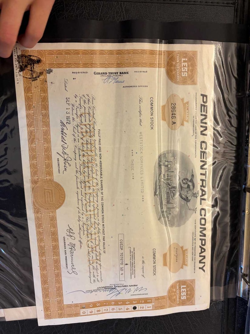 A collection of share certificates, - 13