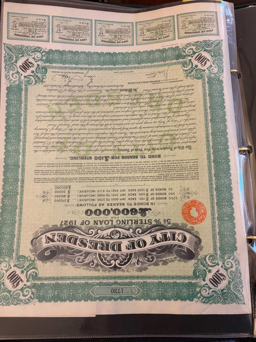 A collection of share certificates, - 18