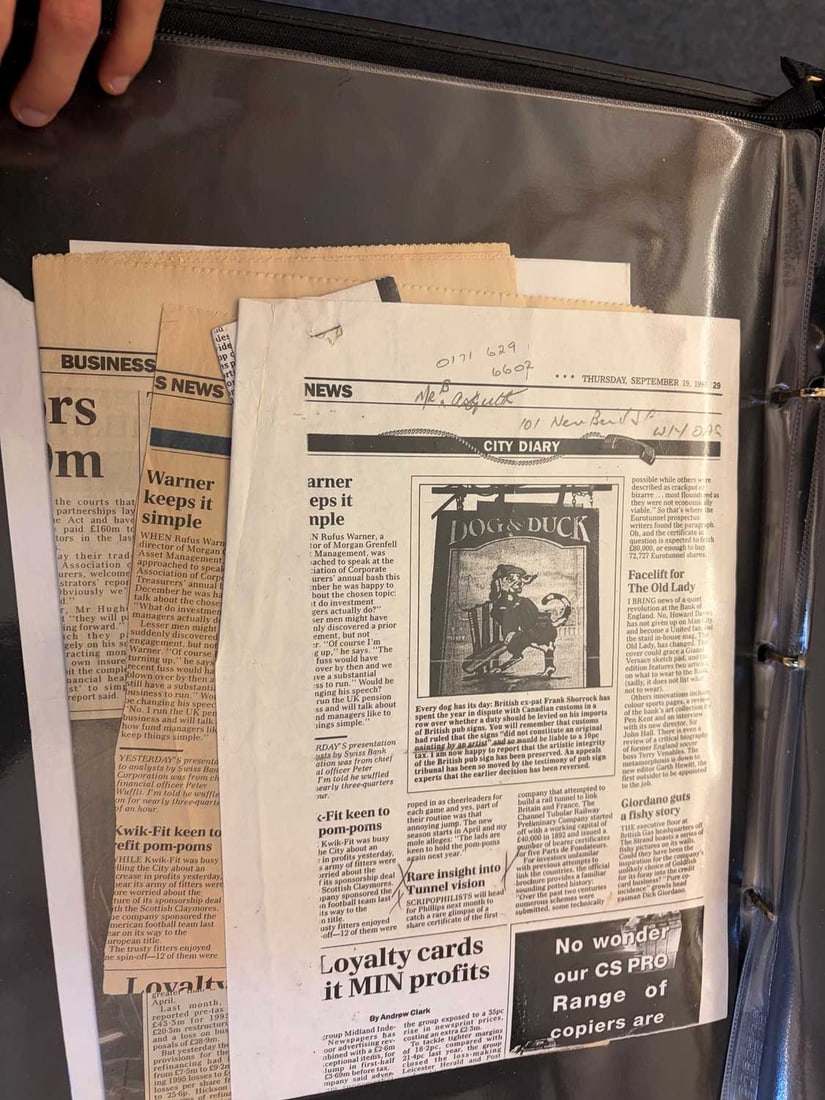 A collection of share certificates, - 7