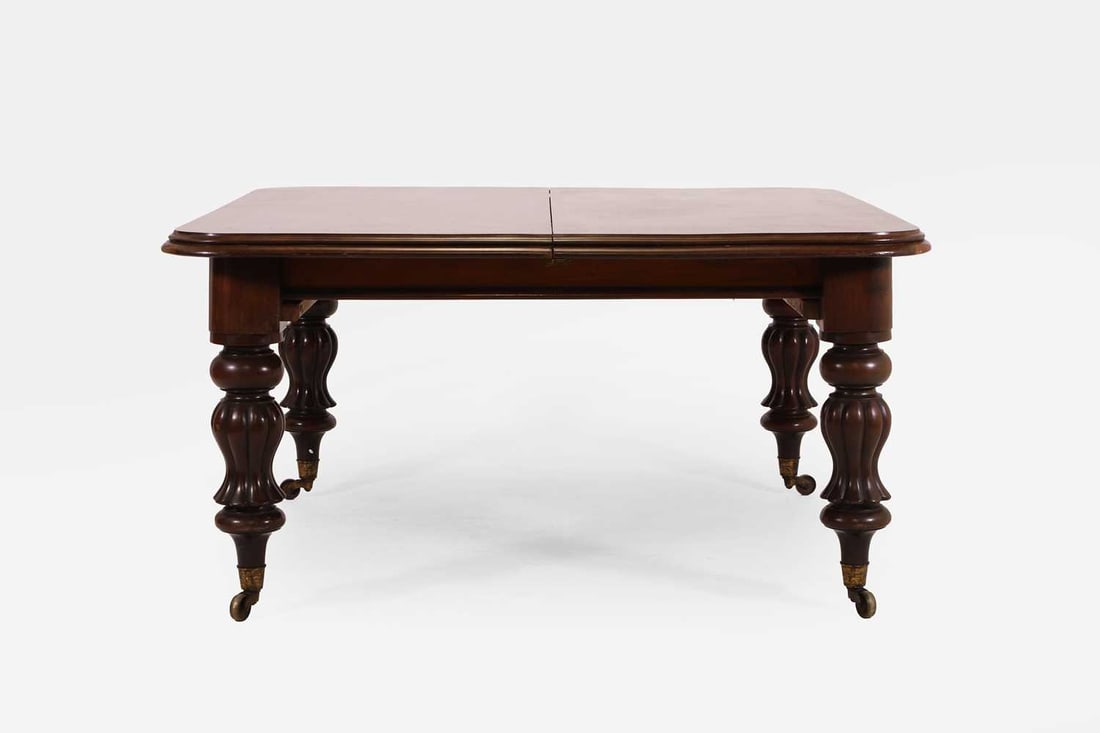 A Victorian mahogany extending dining table, c.1840, - 2