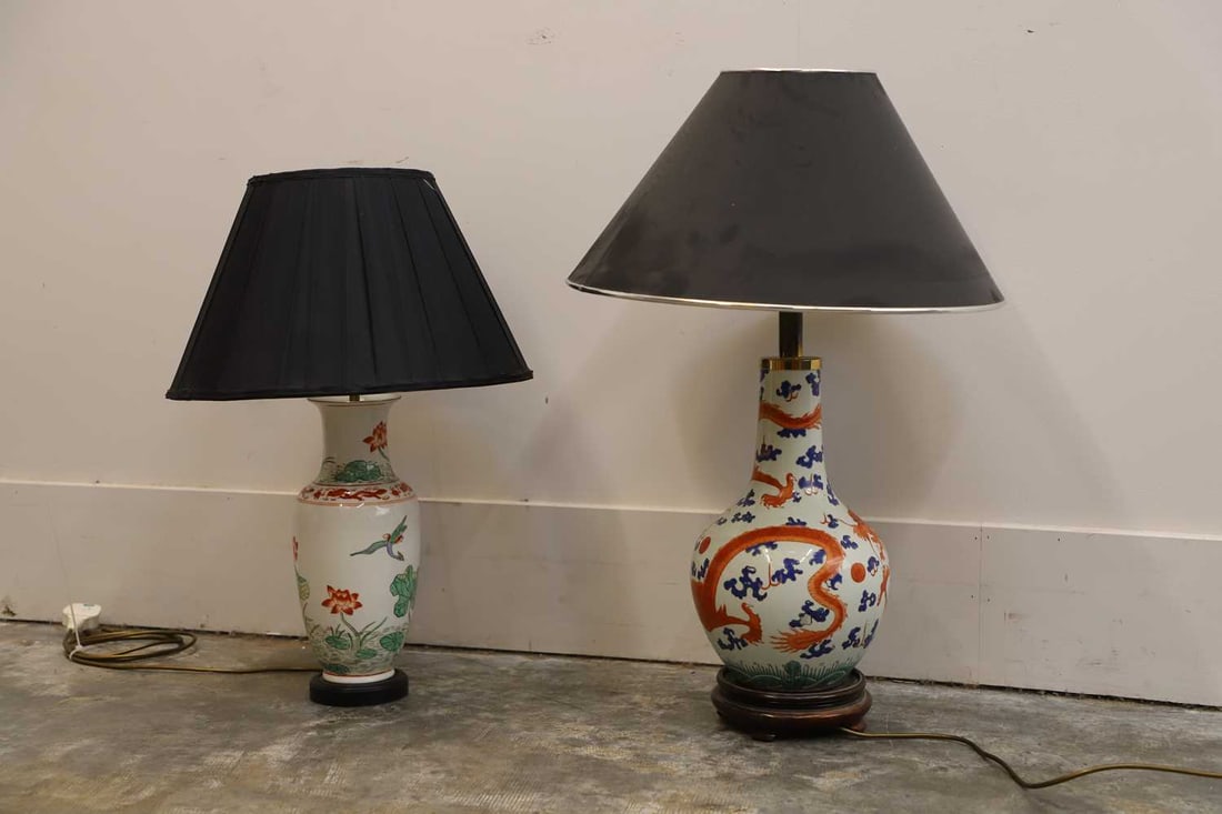 A Chinese 'Dragon' table lamp, 20th century,: A Chinese 'Dragon' table lamp, 20th century, with a shade and plinth, and another table lamp, in Chinese style, with a black pleated shade 79cm high and 67cm high2Condition