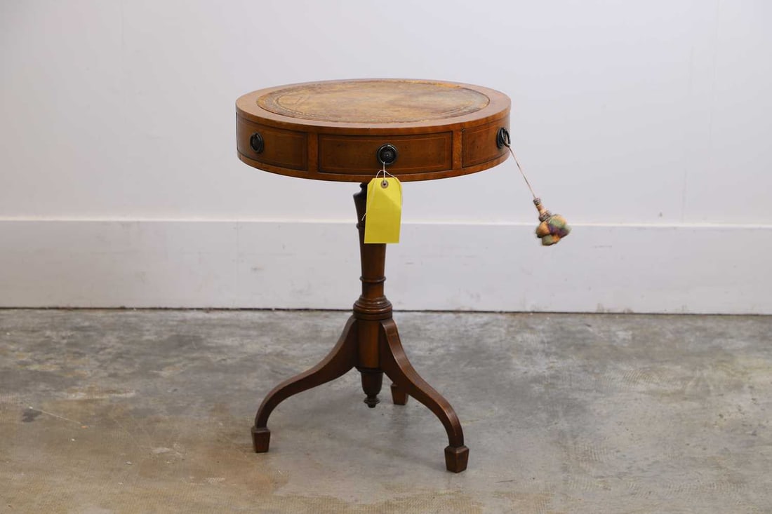 A mahogany drum table, 20th century, - 2