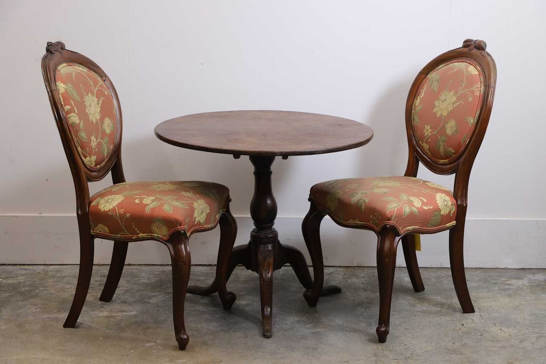 An oak tripod table, 20th century,: An oak tripod table, 20th century, with a circular top, raised on a turned column, on a tripod base, together with a pair of side chairs 78cm diameter, 76cm high, chairs, 50cm wide, 67cm deep, 99cm h