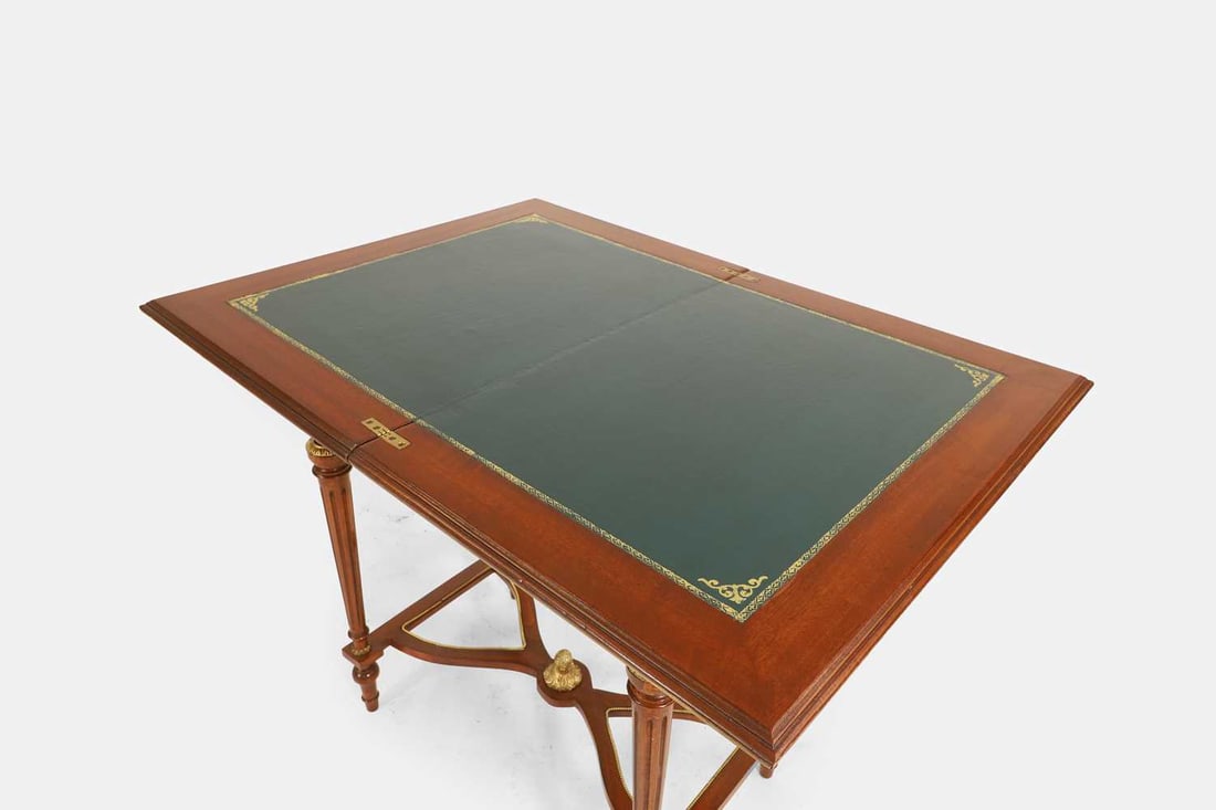A Louis XVI-style walnut, marquetry and penwork games table, first half of the 20th century, French, - 7