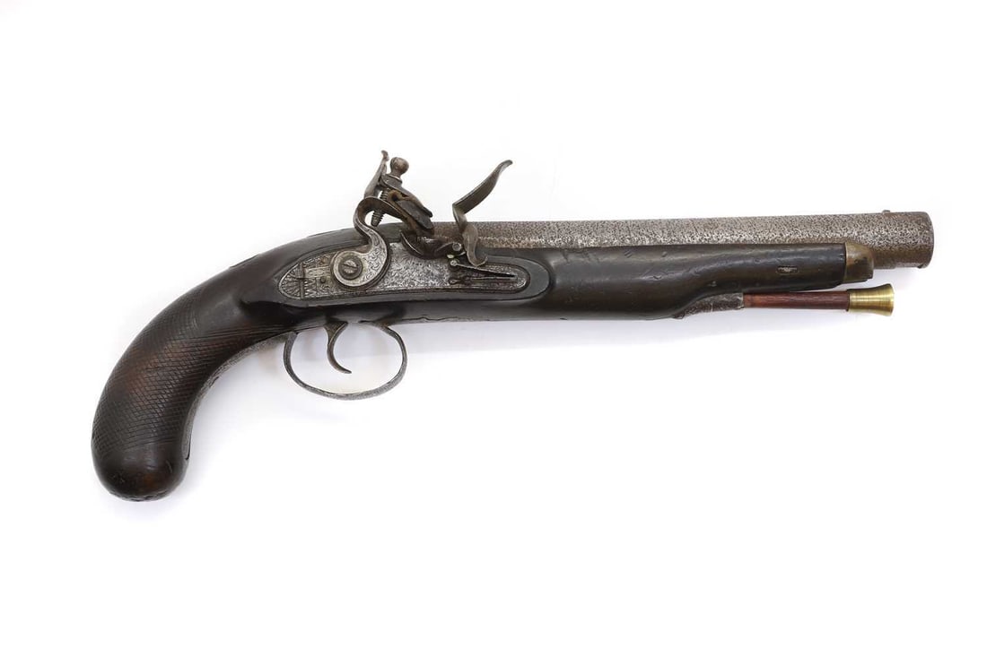 A flintlock officer's pistol, late 18th to early 19th century,: A flintlock officer's pistol, late 18th to early 19th century, with tapering 9 inch barel of octagonal to round form, with flint lock mechanism and a swan neck cock, the lock plate with chased foliat