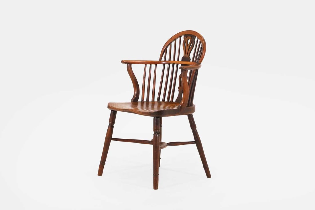 A yew and elm Windsor armchair, early 19th century, North-East Midlands, - 2