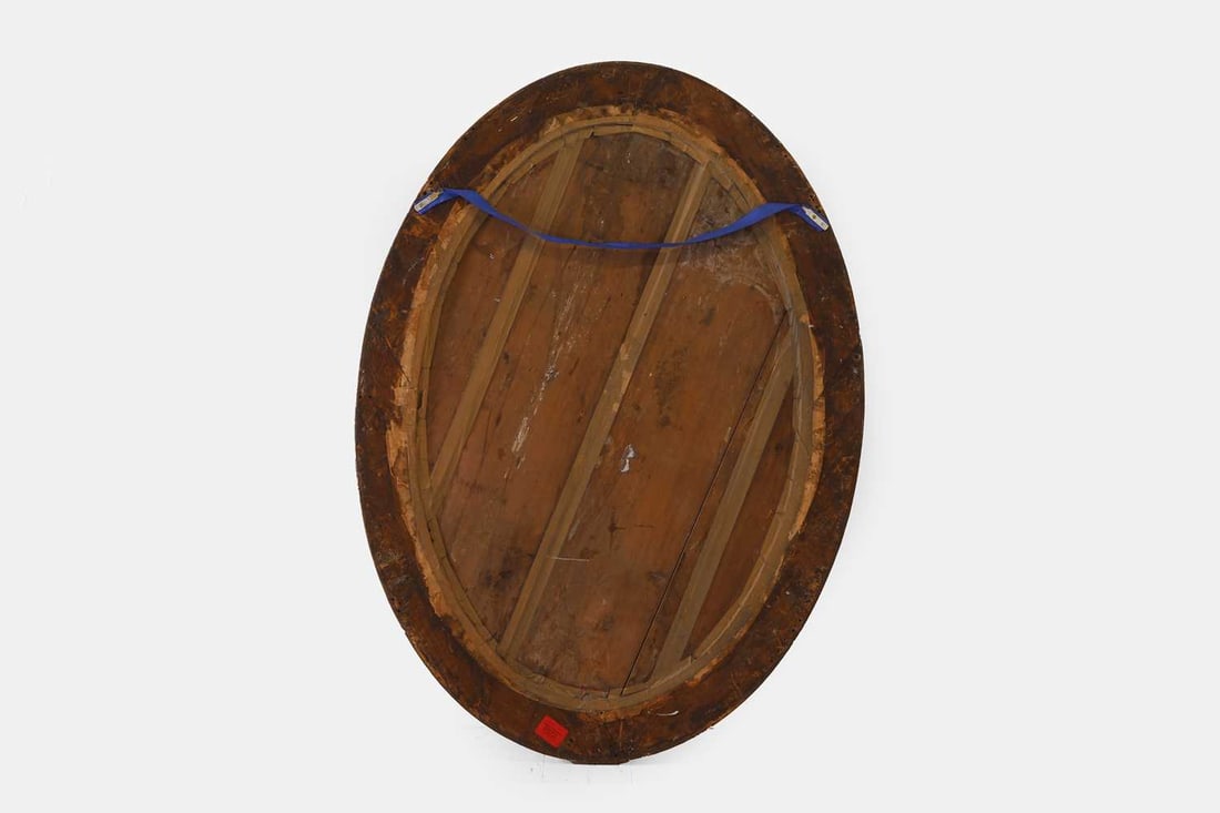 A George III carved giltwood and verre églomisé mirror, c.1780, - 2