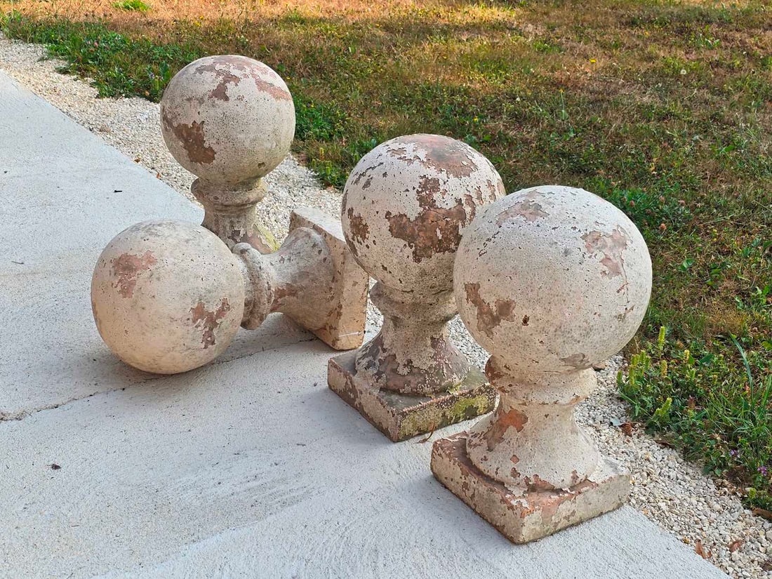 Four composite stone finials, - 2