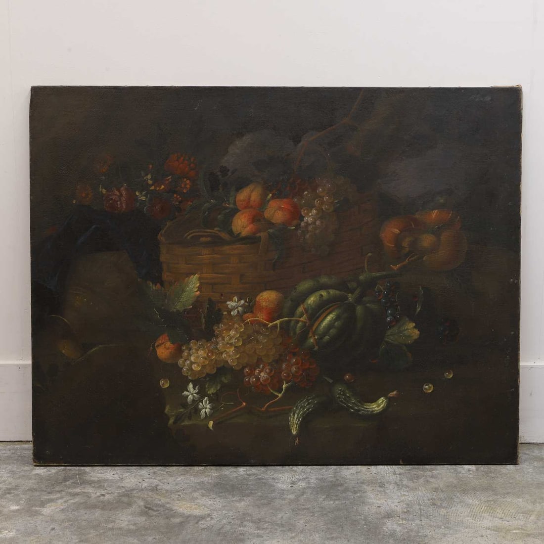 Probably Flemish school, 19th century,: Probably Flemish school, 19th century, A still life of fruits and vegetables overflowing from a wicker basket, set upon a stone ledge oil on canvas, 93 x 120cm Provenance: The Select Contents of a