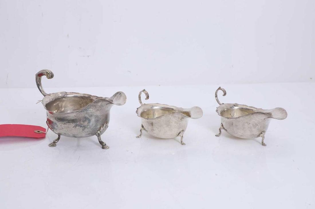 A collection of three silver sauce boats, (1 of 1)
