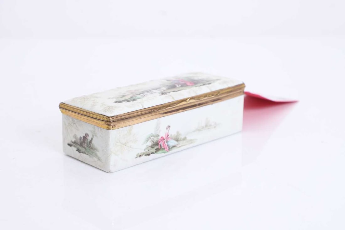 An enamel table box, c.1765-1770, Italian,: An enamel table box, c.1765-1770, Italian, with gilt metal mount, the top and sides painted with figures in Italianate landscapes, with raised relief with bianco sopra bianco foliage, the interior