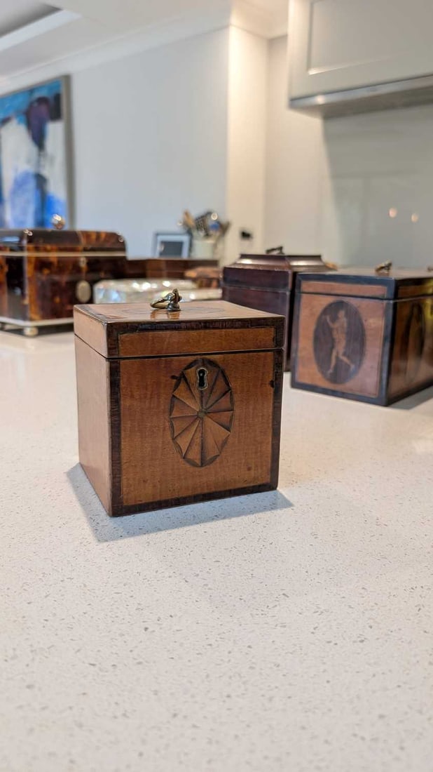 A small square sycamore tea caddy, 20th century, - 2
