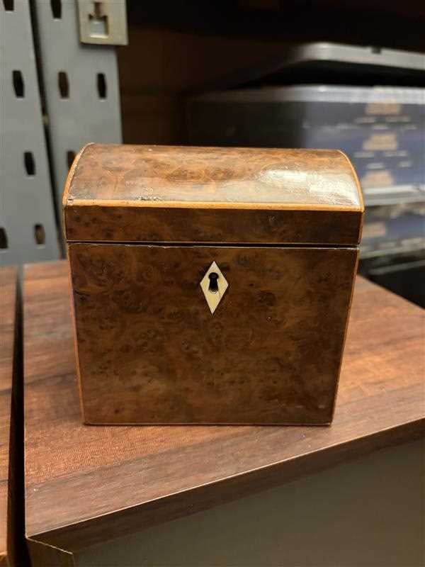 A small burr yew tea caddy, - 2