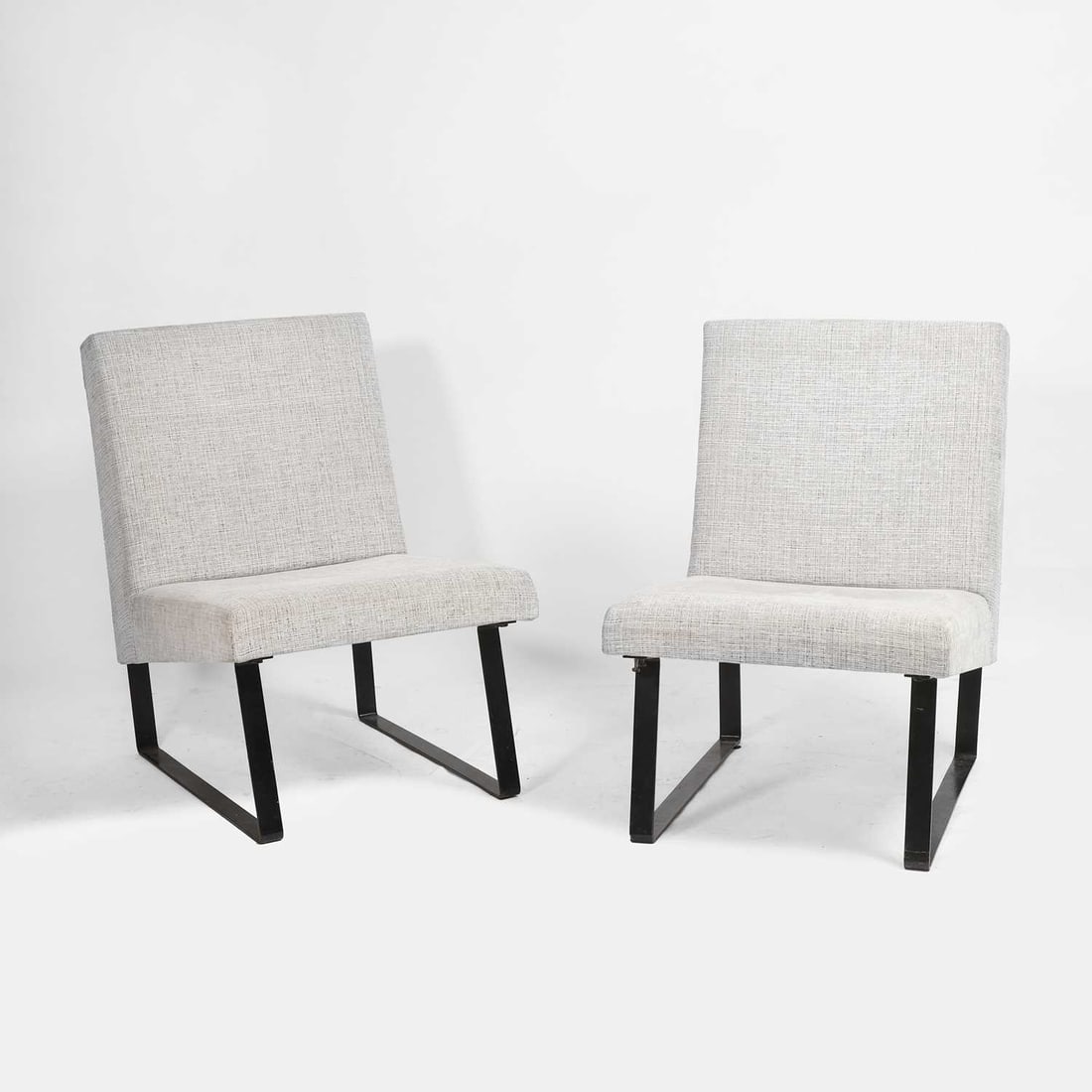 Contemporary A pair of side chairs: Contemporary A pair of side chairs Bouclé upholstery, of recent manufacture, raised on painted metal frames 55cm wide, 65cm deep, 80cm high, seat 41cm 2