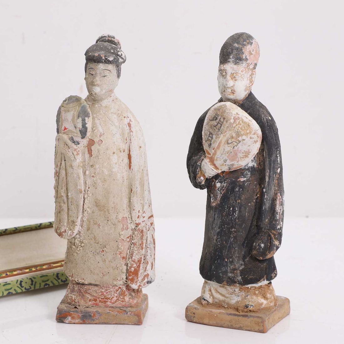 A pair of Chinese terracotta tomb attendants, circa 16th century, - 2